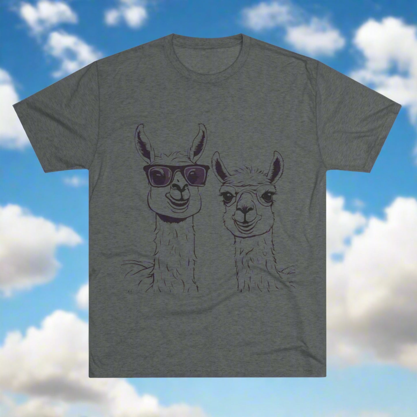 A gray Llamas - Tri-Blend Crew Tee - Unisex Fit from Printify featuring a minimalist drawing of two llamas. The llama on the left sports large sunglasses, while the llama on the right has a relaxed expression. Both llamas are outlined in a dark, subtle color. Perfect for fans of llama love and casual wear!