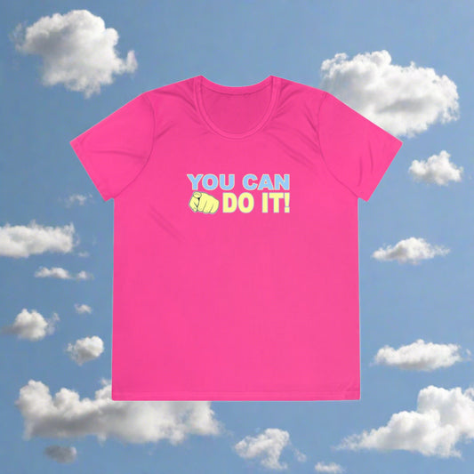 A bright pink, moisture-wicking polyester You Can Do It - Ladies Competitor Tee t-shirt from Printify with the motivational phrase "you can do it!" printed in bold, yellow letters, accentuated by a small graphic of a clenched fist.
