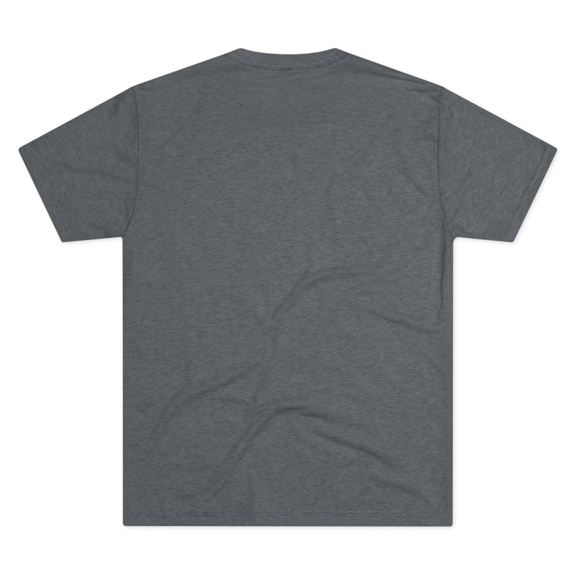 A plain, dark gray, short-sleeve t-shirt seen from the back. The "Unleash Your Inner Doggie - Tri-Blend Crew Tee - Unisex Fit" by Printify is made from a premium blend of soft, slightly heathered fabric, it lays unwrinkled and flat against a white background, embodying versatile fashion and sustainable practices.