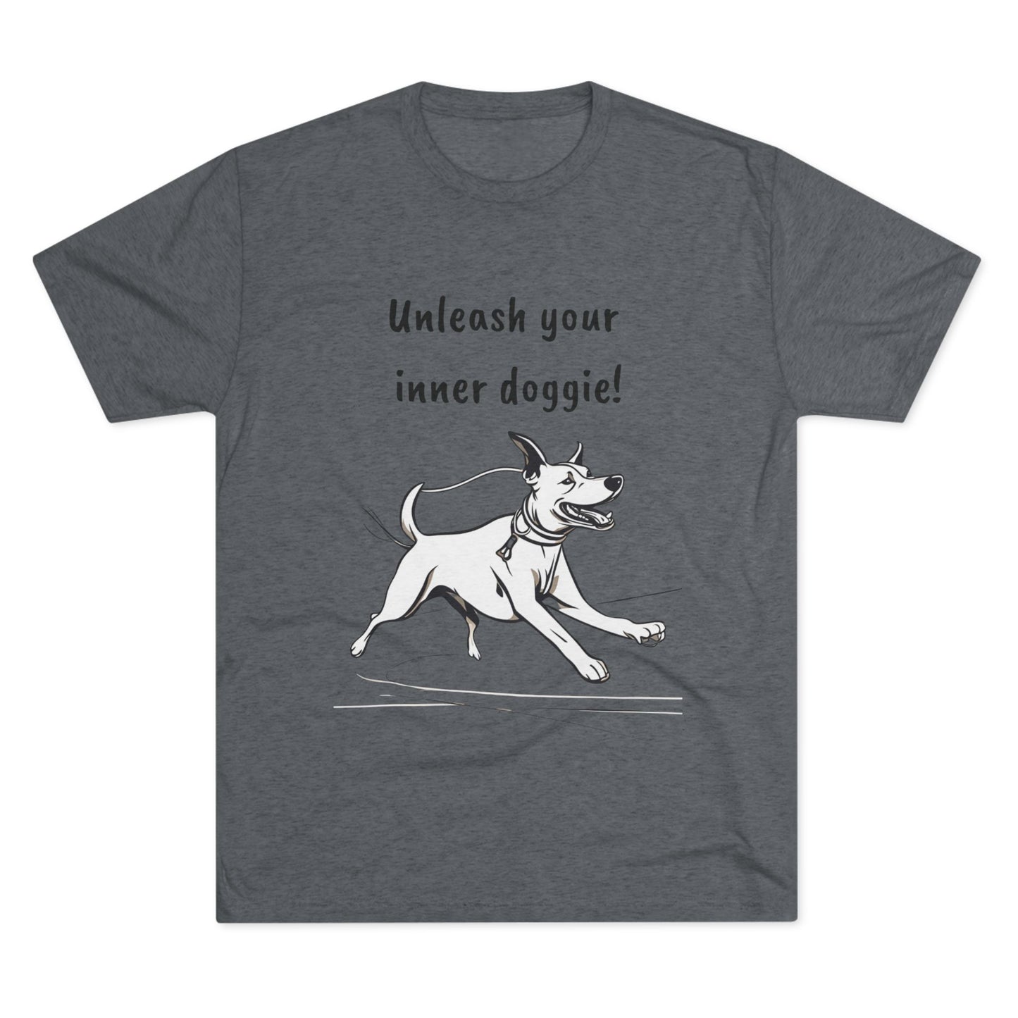 The Printify "Unleash your inner doggie" Tri-Blend Crew Tee - Unisex Fit features a gray t-shirt with an illustration of a happy dog running. Above the dog, bold black text reads "Unleash your inner doggie!" This shirt, made from a premium blend for comfort, has short sleeves and a crew neckline.